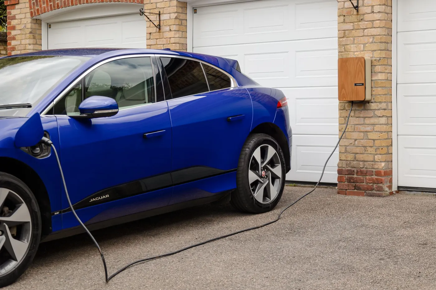 Electric car charging in a home garage
