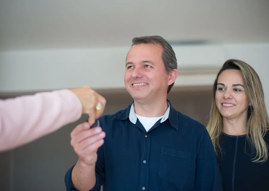 A technician walking a homeowner through a project