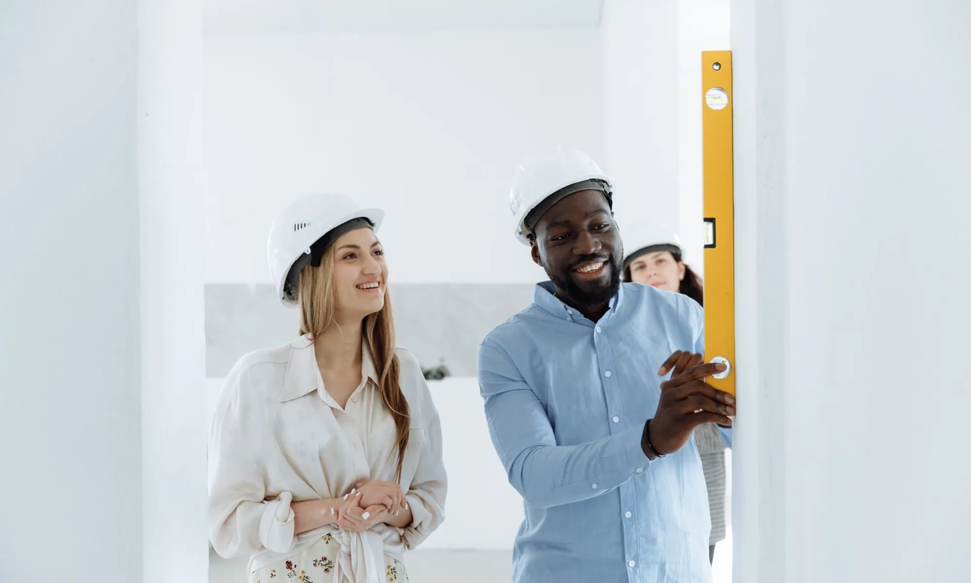 A contractor walking a homeowner through her project